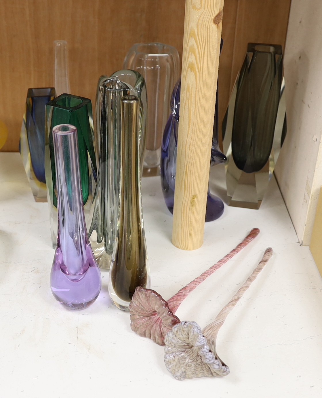 Twelve items of art glass, ten vases and two decorative flowers with long stems, including three Murano Sommerso faceted vases, tallest 23 cm